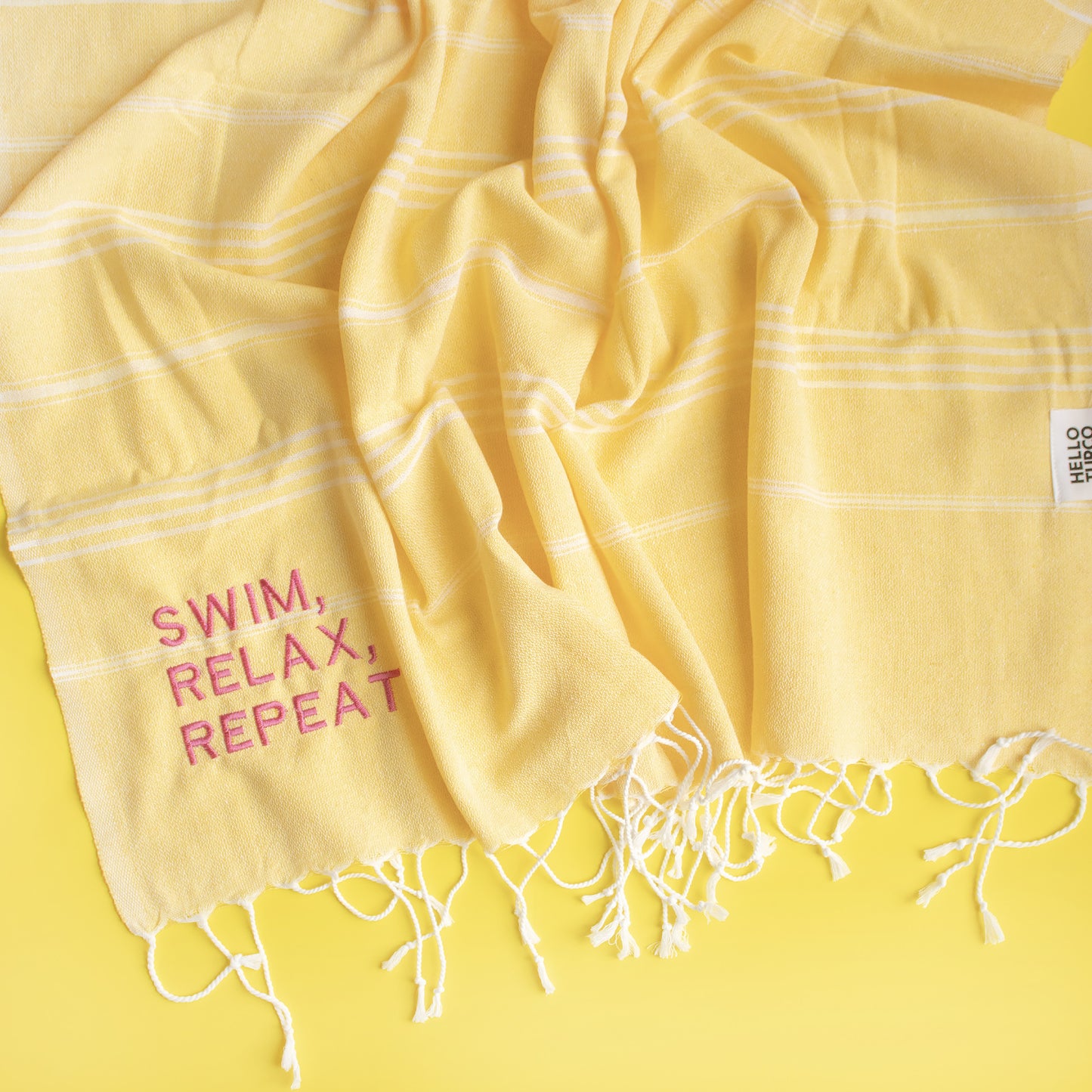 "SWIM, RELAX, REPEAT" embroidered Hammam Towel